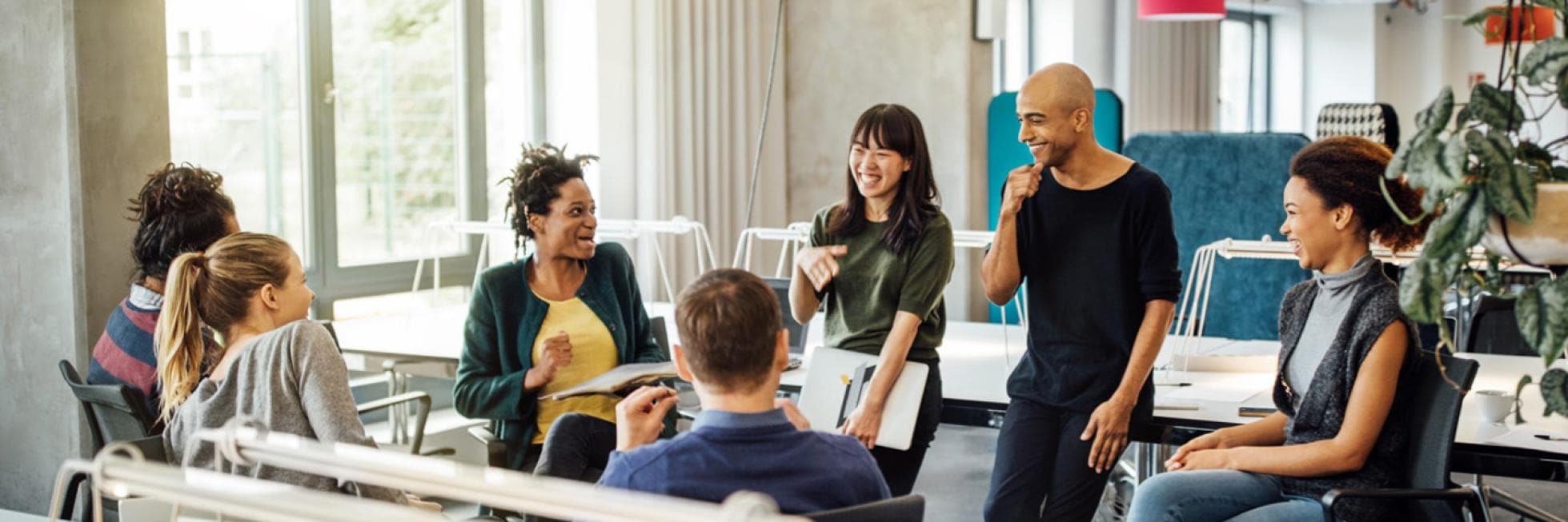 group of people sitting and chatting